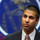 In this Dec. 14, 2017 photo, Federal Communications Commission Chairman Ajit Pai arrives for an FCC meeting on net neutrality, in Washington.